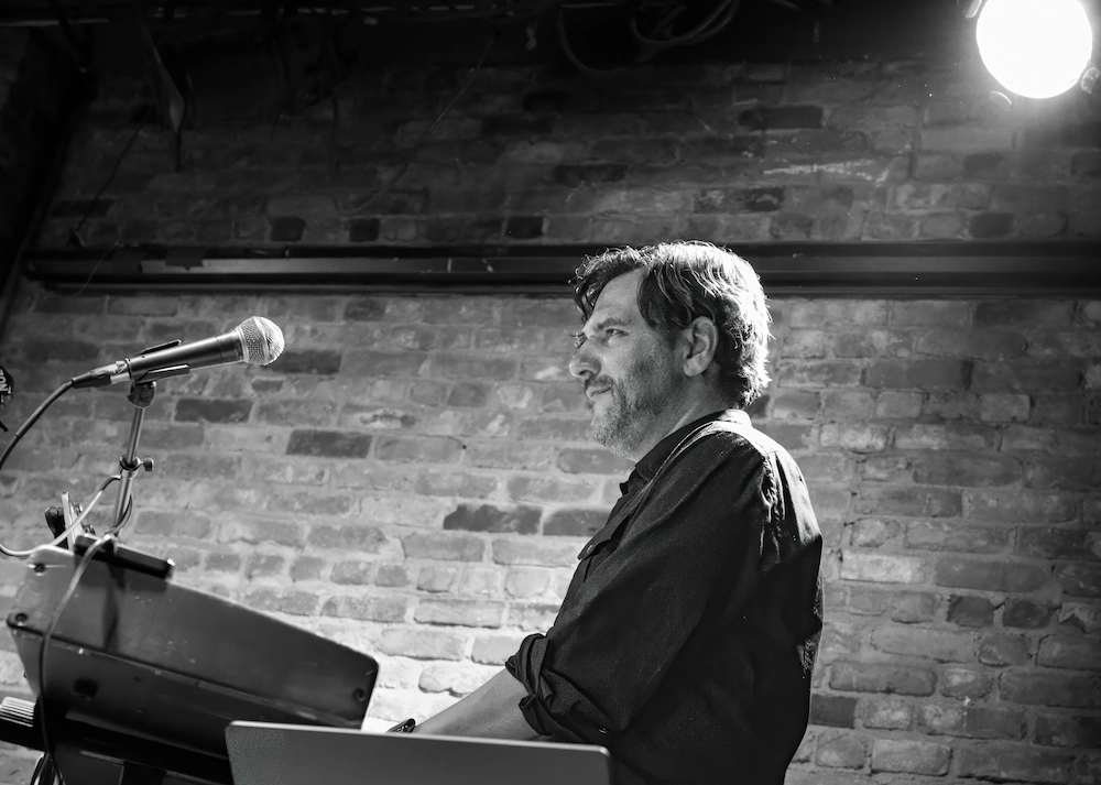 Adam Blau performing live